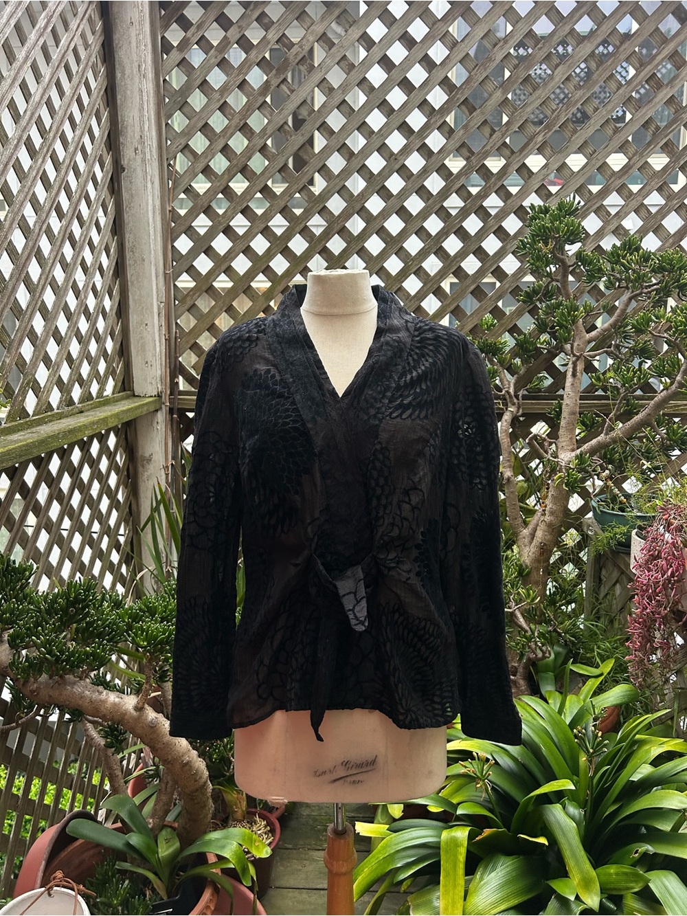 Etcetera Black Textured  Blouse with tie.
V-Neck. Size-16.  Burnout look.  EUC